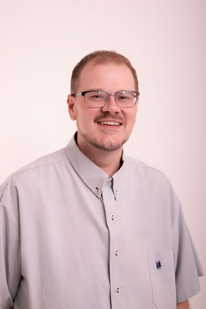 Prof. Christopher Sampson